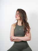 Padded extended vest sports bra in Olive Green – front view